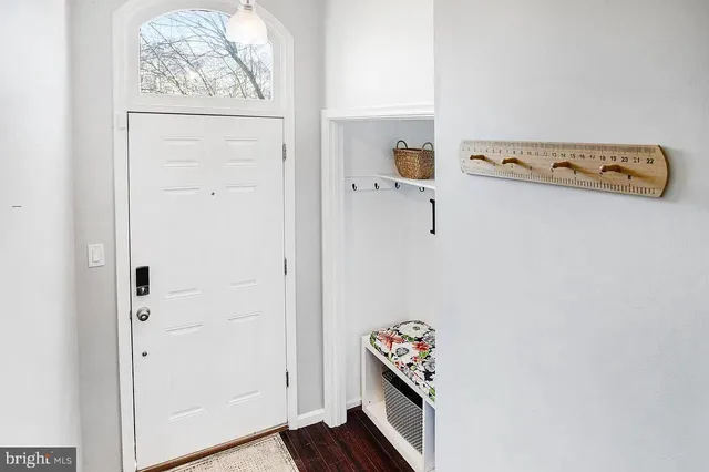 a bathroom with a tub a sink and mirror