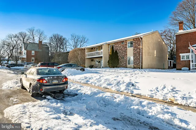 a view of a parking space in the middle of a yard