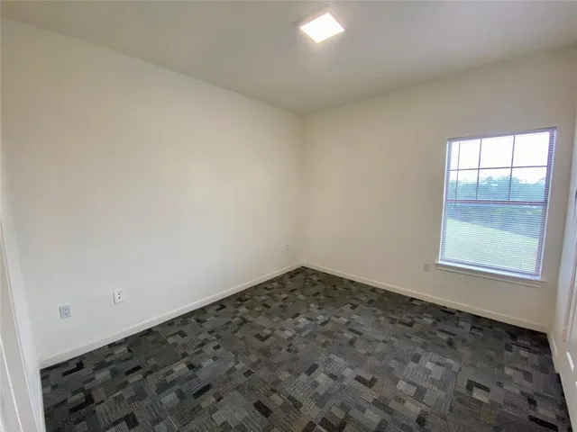 a front view of a building with street view