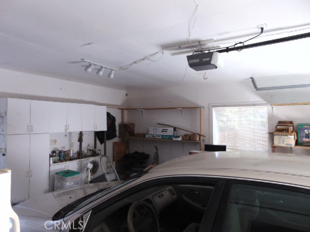 3835 Gardiner Ferry Road, Unit 62 Corning, CA 96021 - Photo 31 of 34 a kitchen with lots of counter space and windows