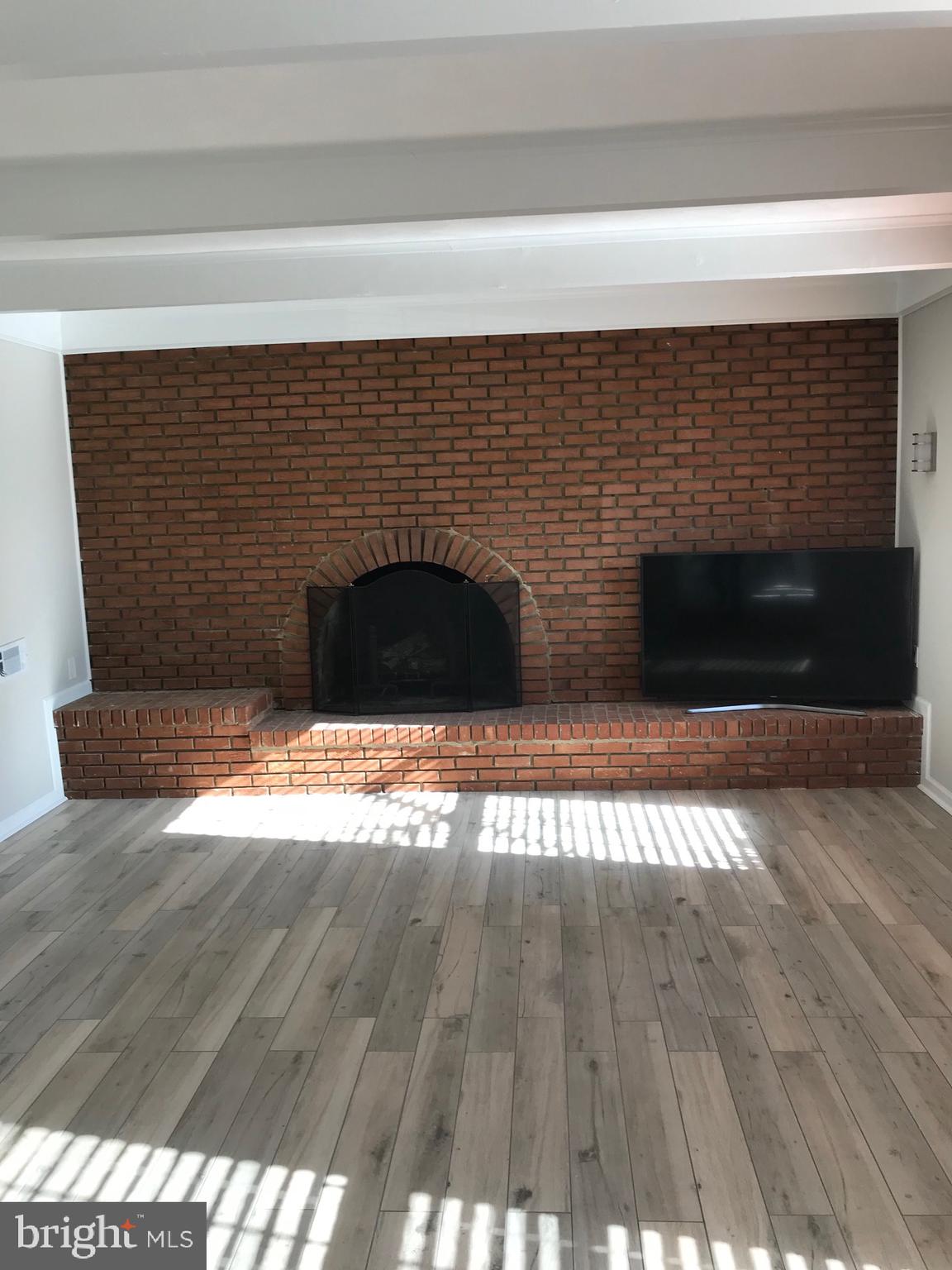 8212 Mockingbird Drive Annandale, VA 22003 - Photo 16 of 25 Family room fireplace