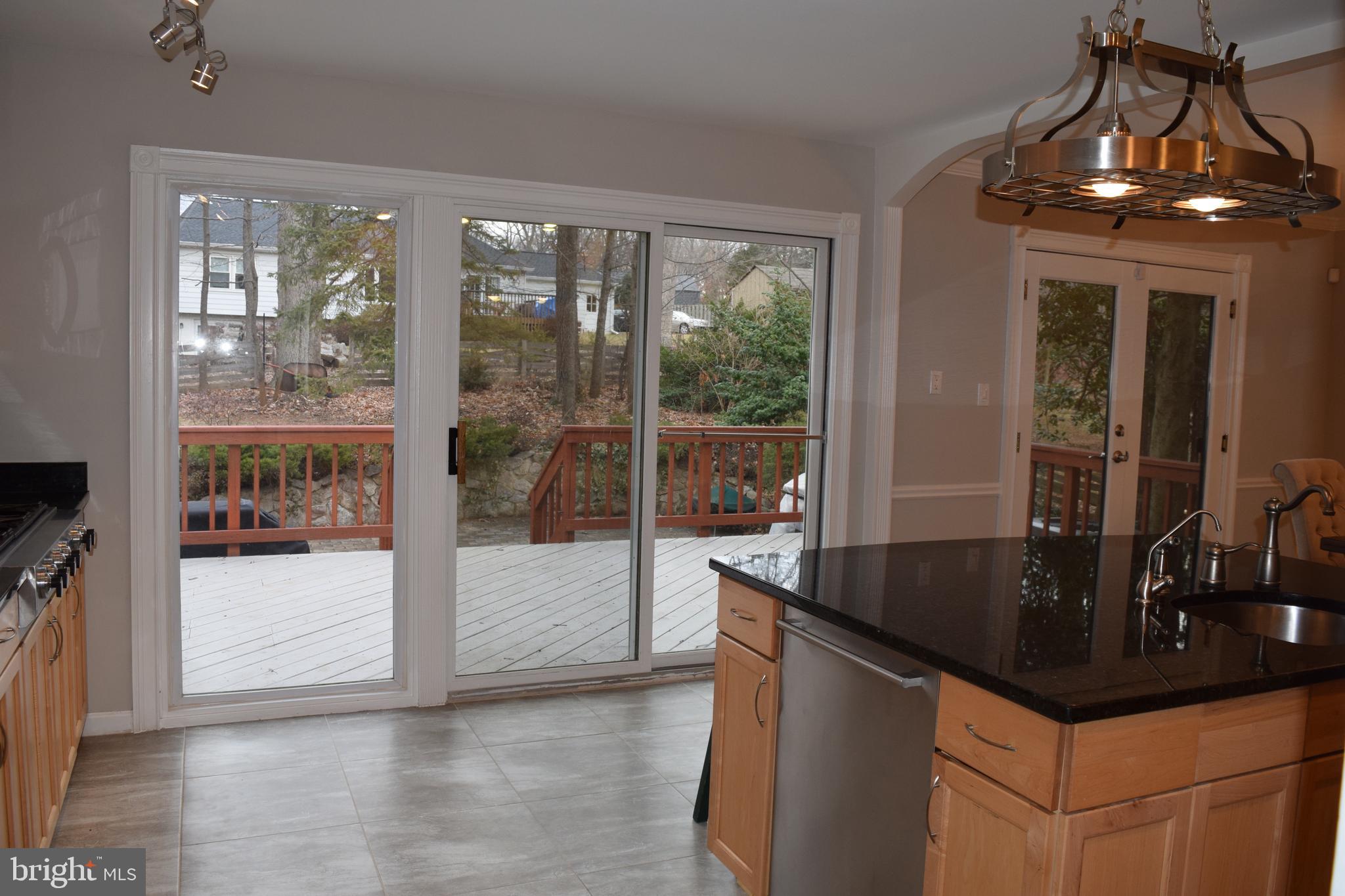 8212 Mockingbird Drive Annandale, VA 22003 - Photo 9 of 25 Sliding glass doors from kitchen to deck