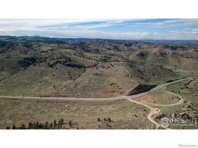 a view of a dry yard with wooden floor