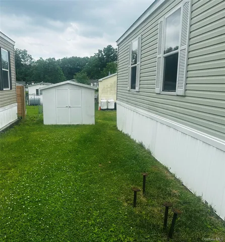 a view of a back yard of the house