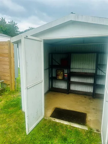 a view of swimming pool yard from a living room