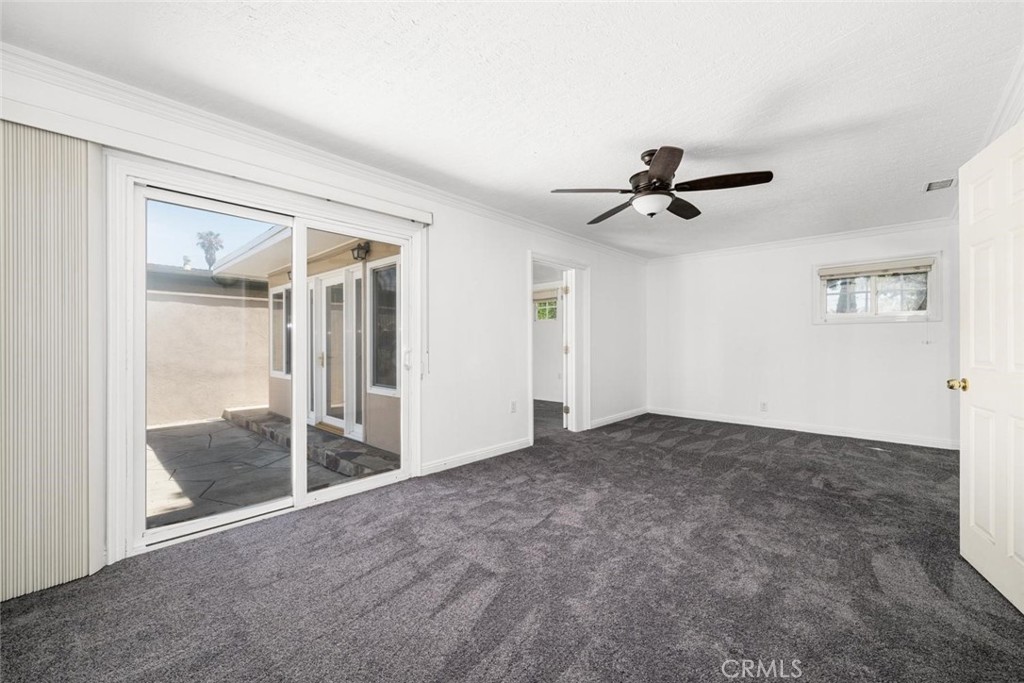 1238 North Studebaker Road Long Beach, CA 90815 - Photo 18 of 47 a view of a room with a ceiling fan