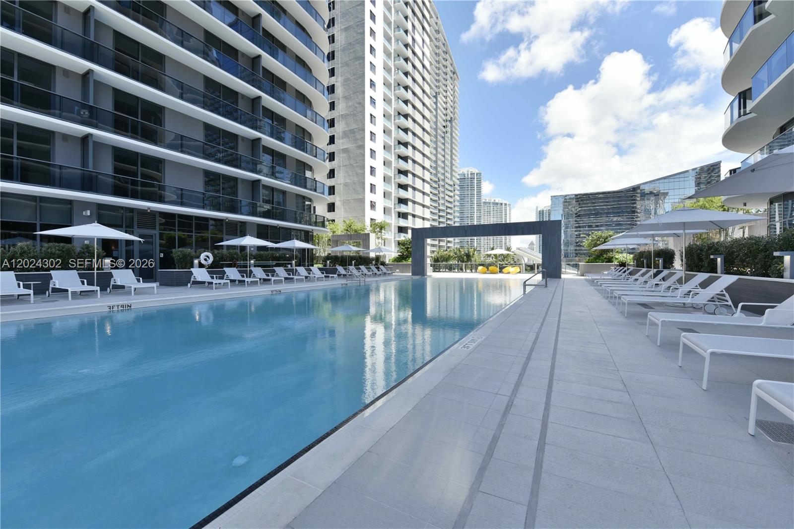 45 Southwest 9th Street, Unit 2109 Miami, FL 33130 - Photo 35 of 40 a view of swimming pool from a balcony