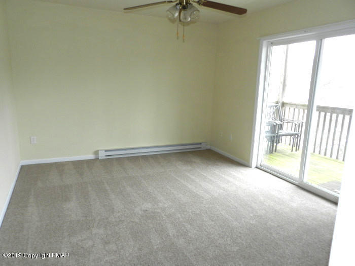 5918 Decker Road Bushkill, PA 18324 - Photo 6 of 31 an empty room with a empty space and a window