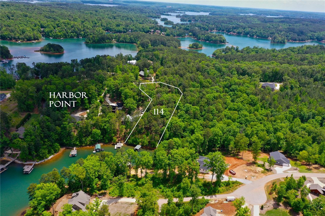 Lot 114 Harbor Point Seneca, SC 29672 - Photo 17 of 46 This tranquil waterfront lot offers breathtaking views and direct lake access, perfect for building your dream retreat.