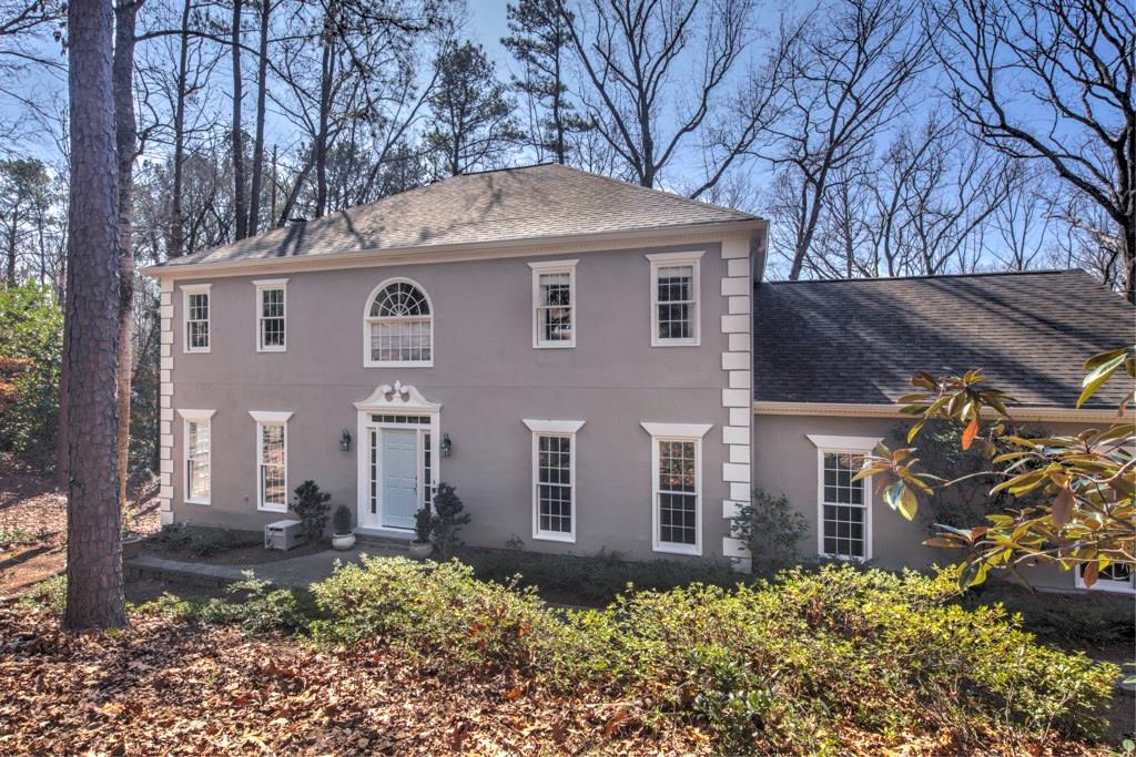 4400 Sentinel Post Road Northwest Atlanta, GA 30327 - Photo 1 of 1 a front view of a house with garden