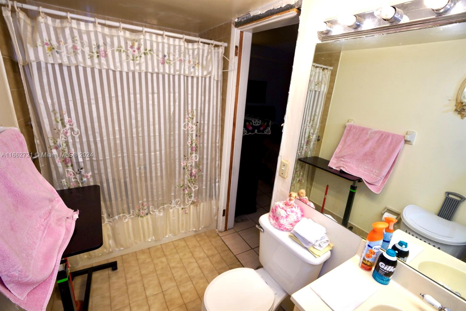 11790 Southwest 18th Street, Unit 2273 Miami, FL 33175 - Photo 14 of 18 a living room with furniture and a couch