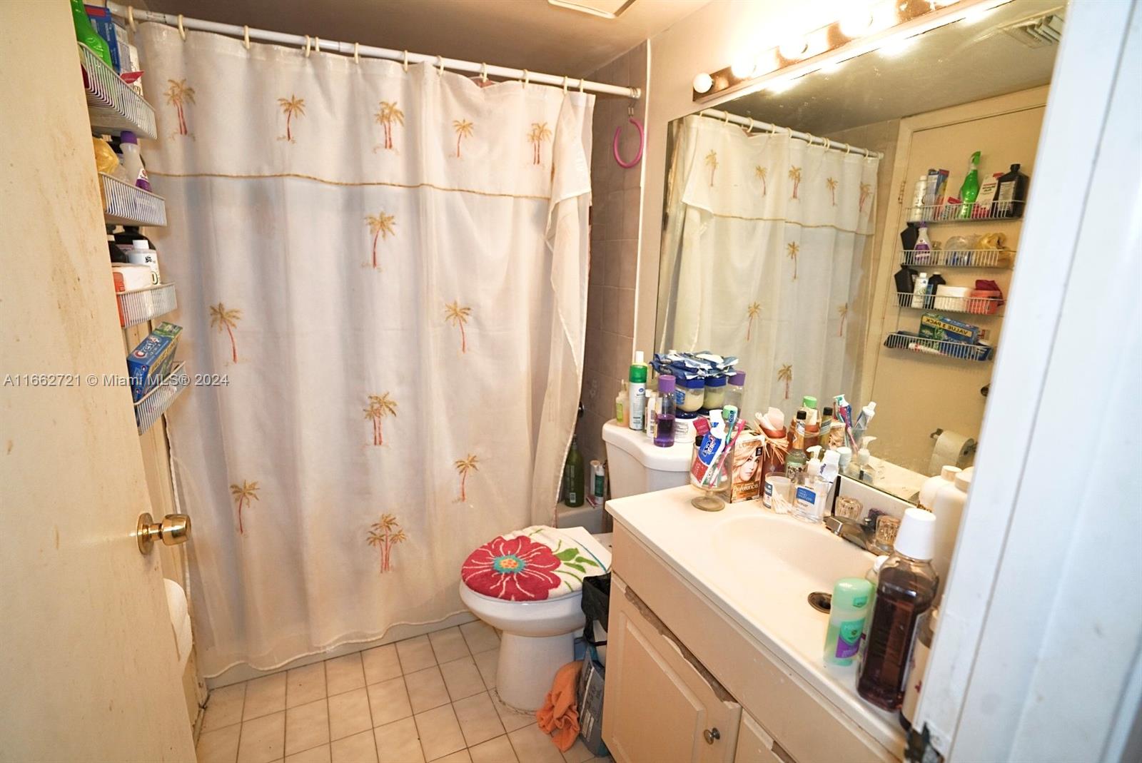 11790 Southwest 18th Street, Unit 2273 Miami, FL 33175 - Photo 17 of 18 a bathroom with a sink toilet and shower