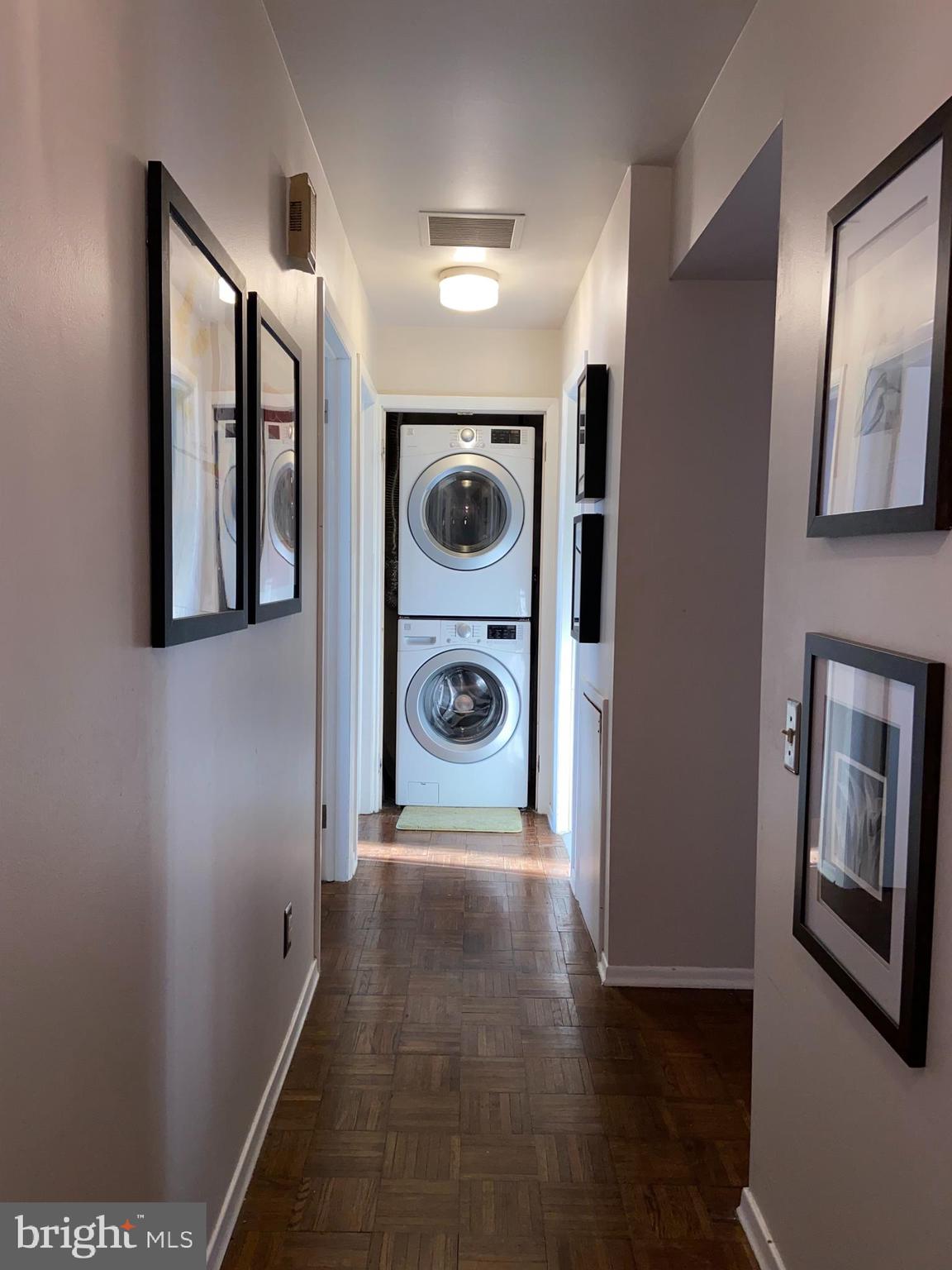 2004 Aspen Circle, Unit 2004UD Springfield, PA 19064 - Photo 17 of 21 Hallway w/washer/dryer