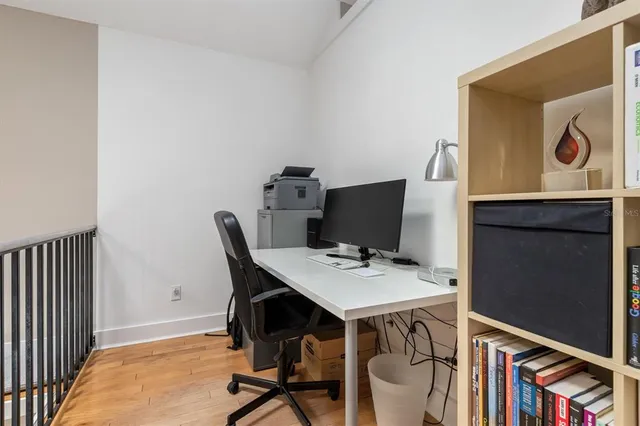 a view of a workspace with furniture