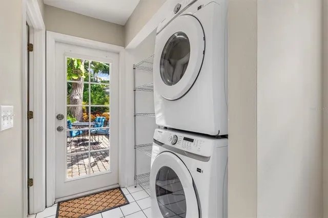 a utility room with dryer and washer