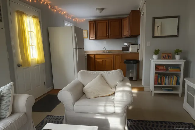 a living room with furniture and a window