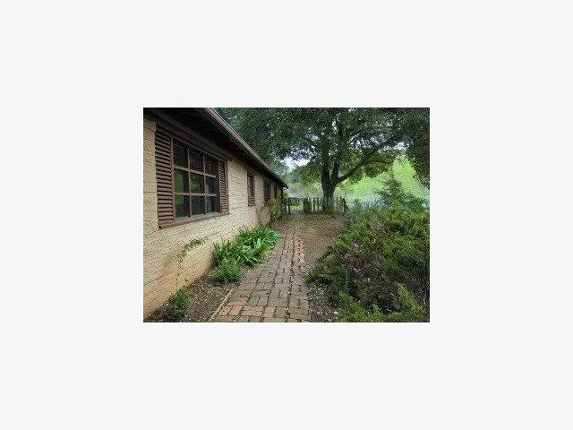 a black and white photo of a house