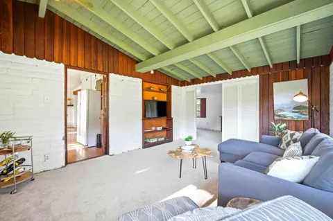 a outdoor living space with furniture and a couch