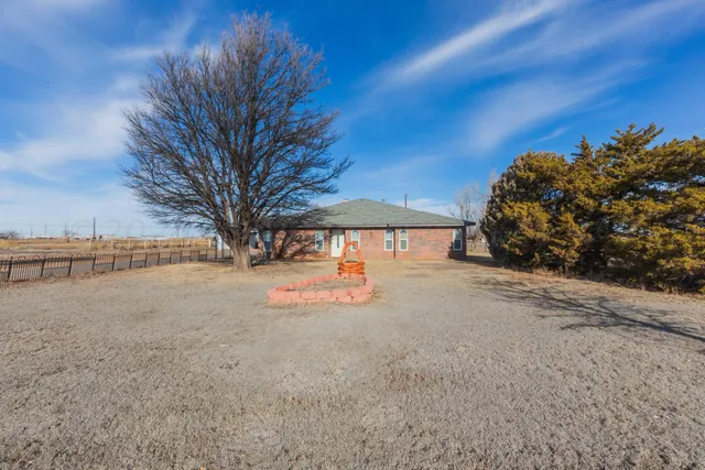 a view of a road with a yard