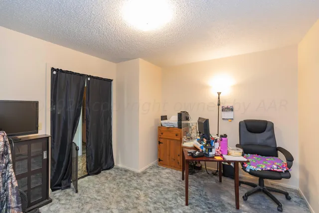 a bathroom with a sink vanity and a mirror