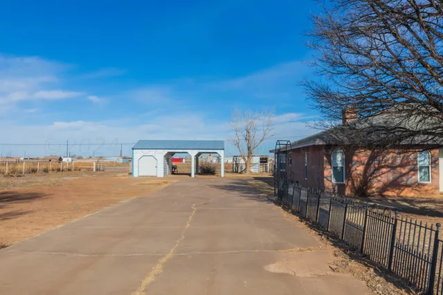 a living room with fireplace furniture and a flat screen tv