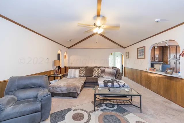 a kitchen with a sink cabinets and window