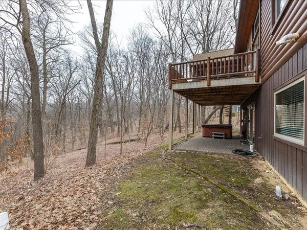 a bedroom with a bed and a table