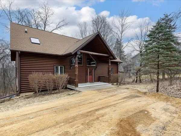 a bathroom with a toilet sink and shower