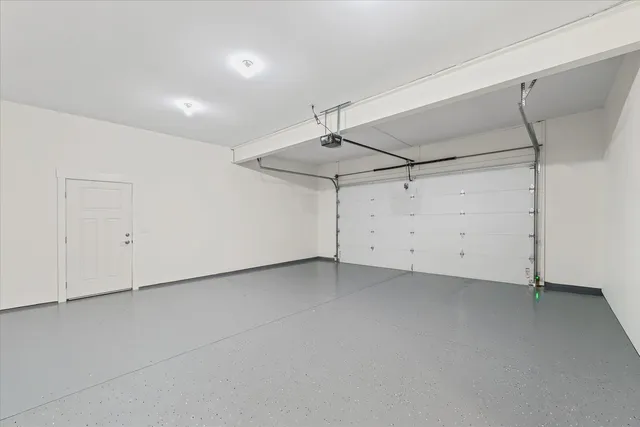 a view of a room with white walls