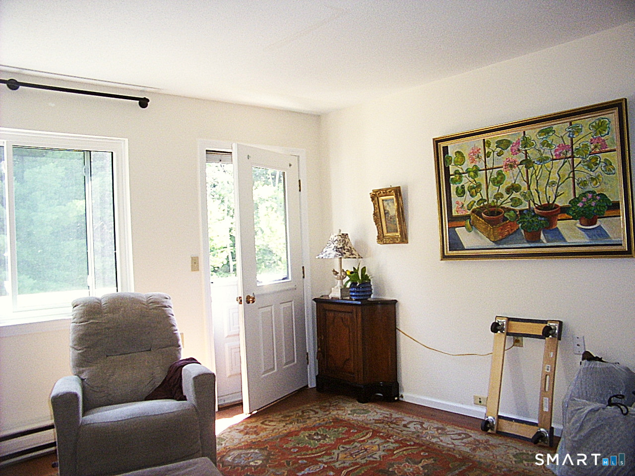 40 Firetown Road, Unit 39 Simsbury, CT 06070 - Photo 10 of 37 Living Room with Direct Access to Wood Deck