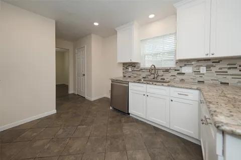 a view of a park with large trees