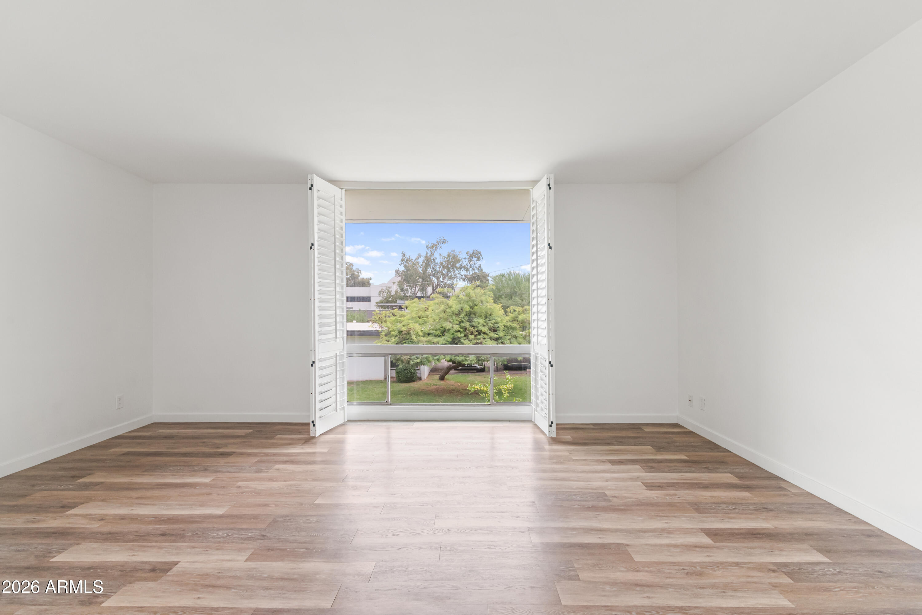 3242 East Camelback Road, Unit 204 Phoenix, AZ 85018 - Photo 7 of 42 Living Room_View 2