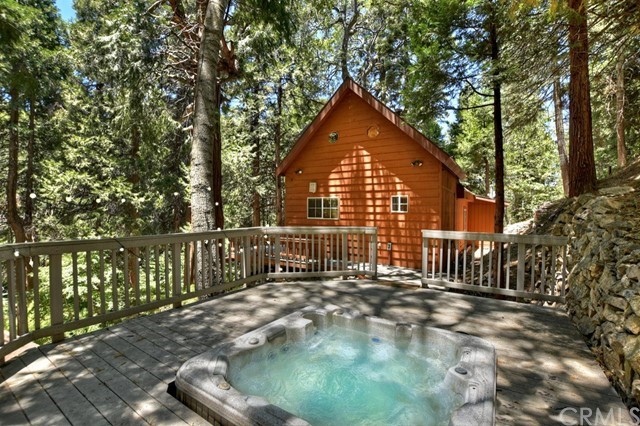 a view of a house with a small yard