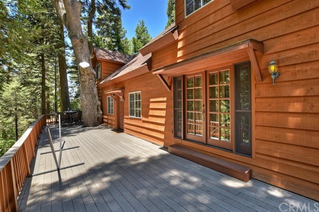 659 Blue Jay Canyon Road Blue Jay, CA 92317 - Photo 12 of 40 a view of backyard with deck and wooden floor