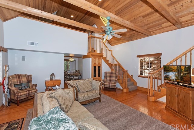 659 Blue Jay Canyon Road Blue Jay, CA 92317 - Photo 13 of 40 a living room with furniture and a flat screen tv