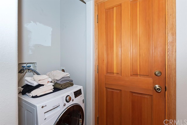 659 Blue Jay Canyon Road Blue Jay, CA 92317 - Photo 28 of 40 a utility room with dryer and washer