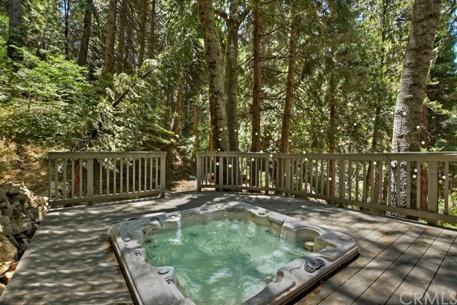 659 Blue Jay Canyon Road Blue Jay, CA 92317 - Photo 34 of 40 a backyard of a house with lots of green space