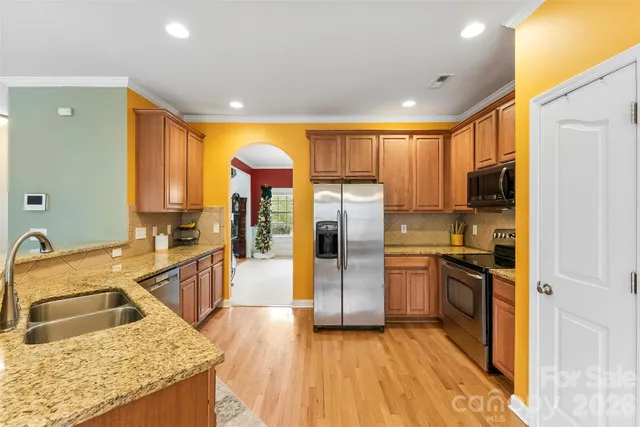 a very nice looking kitchen with a large window