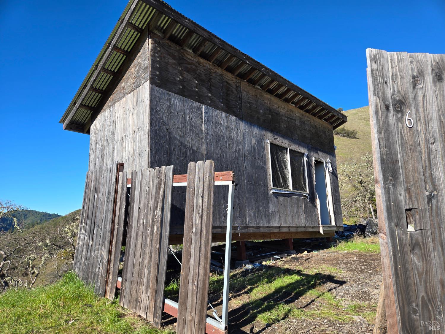 16191 Ridgeview Road Willits, CA 95490 - Photo 7 of 25 a view of a house with backyard and trees