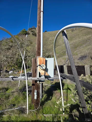a view of a house with a tree
