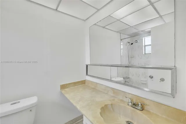 a view of a swimming pool with a balcony