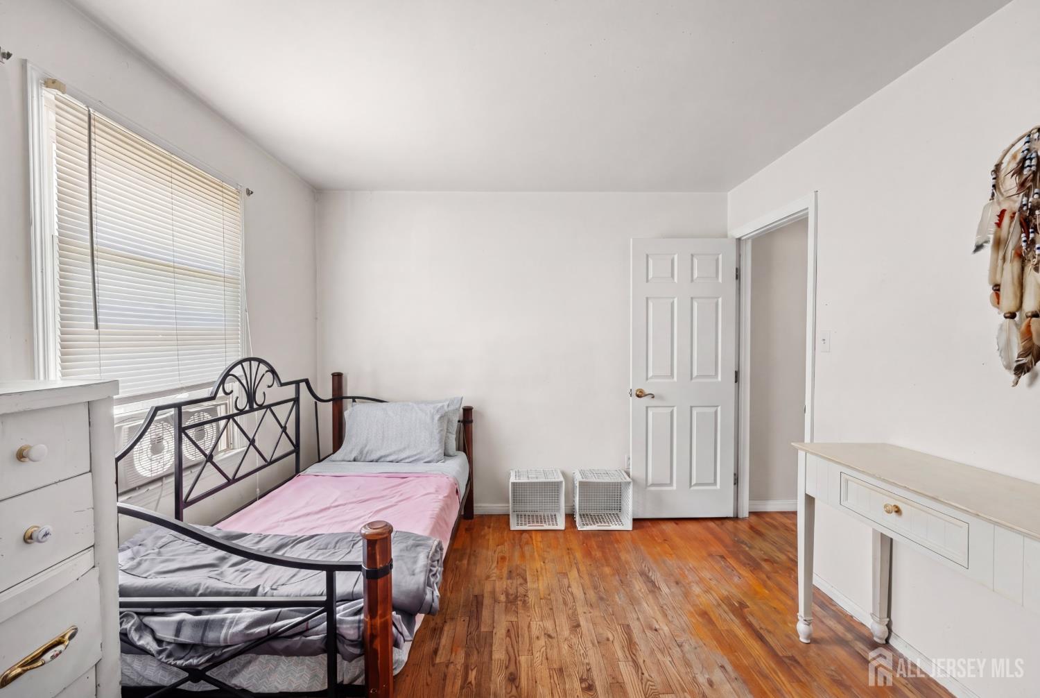 245 4th Street Dunellen, NJ 08812 - Photo 13 of 27 a view of a room with furniture window and wooden floor
