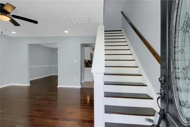 a view of entryway with wooden floor