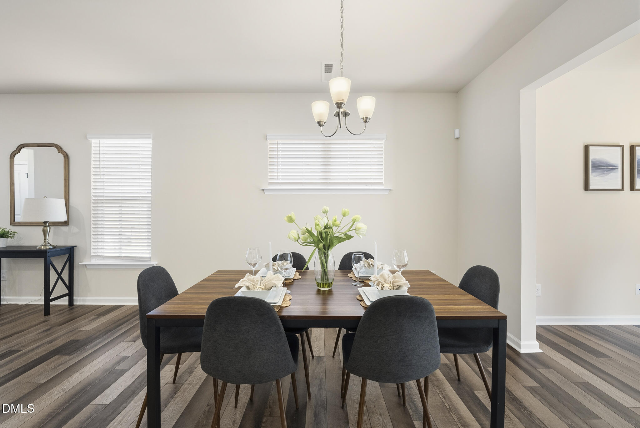 1012 Citadel Avenue Durham, NC 27713 - Photo 15 of 34 a view of a dining room with furniture window and wooden floor
