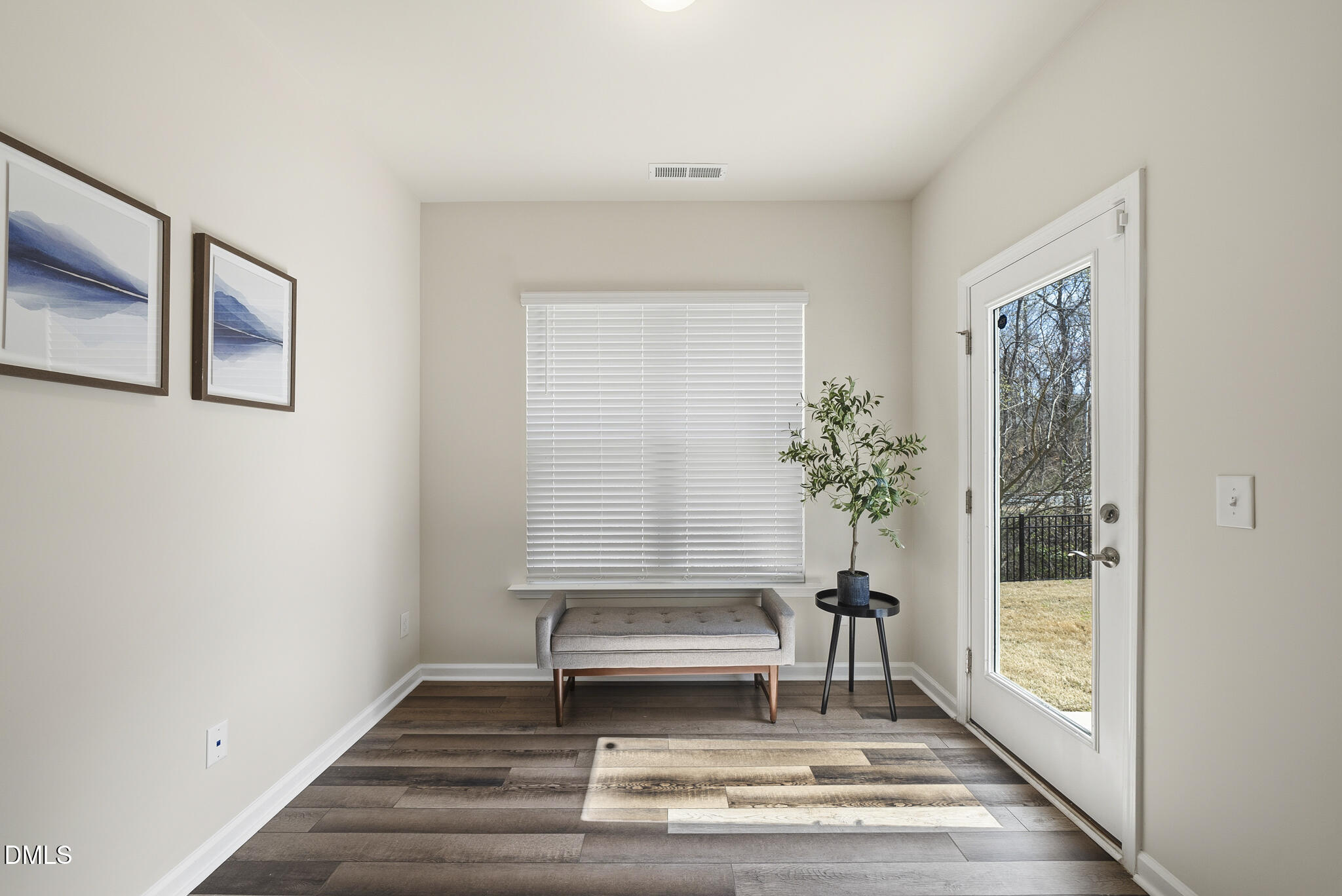1012 Citadel Avenue Durham, NC 27713 - Photo 17 of 34 a view of a hallway with wooden floor and a potted plant
