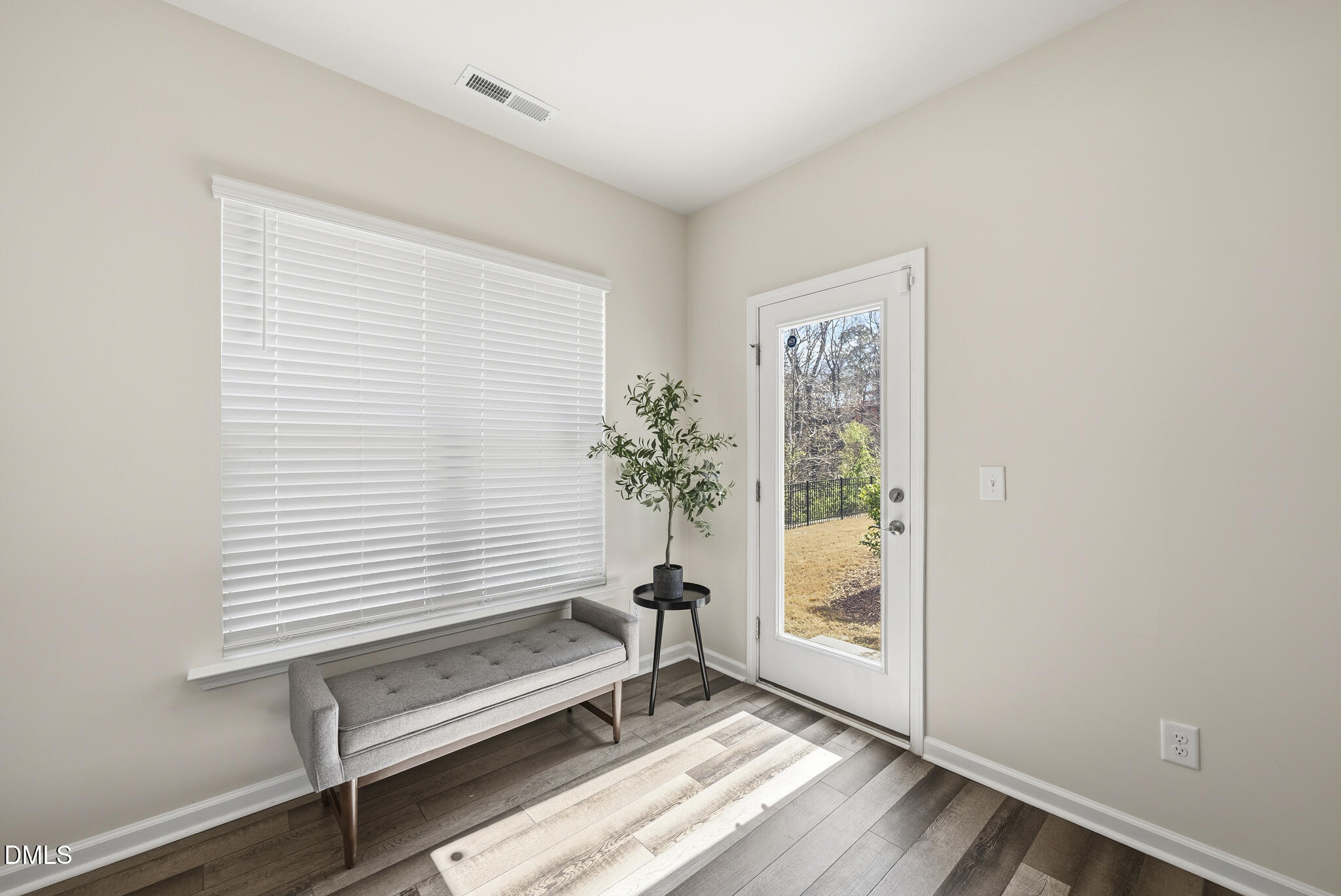 1012 Citadel Avenue Durham, NC 27713 - Photo 18 of 34 a view of a room with a window and wooden floor