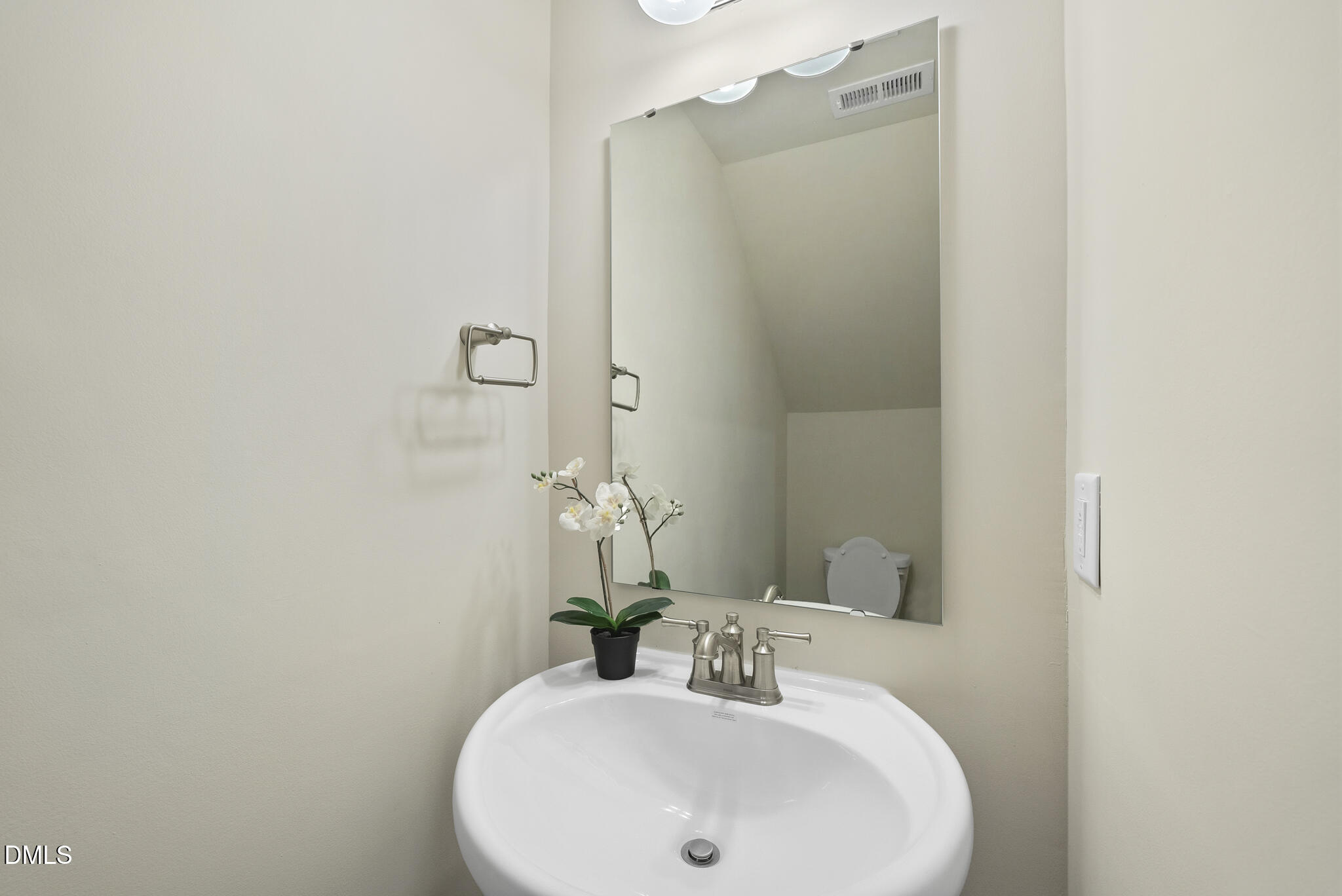 1012 Citadel Avenue Durham, NC 27713 - Photo 21 of 34 a bathroom with a sink and a mirror
