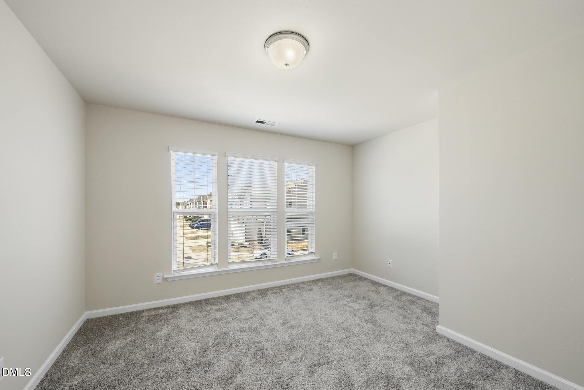 1012 Citadel Avenue Durham, NC 27713 - Photo 22 of 34 an empty room with windows