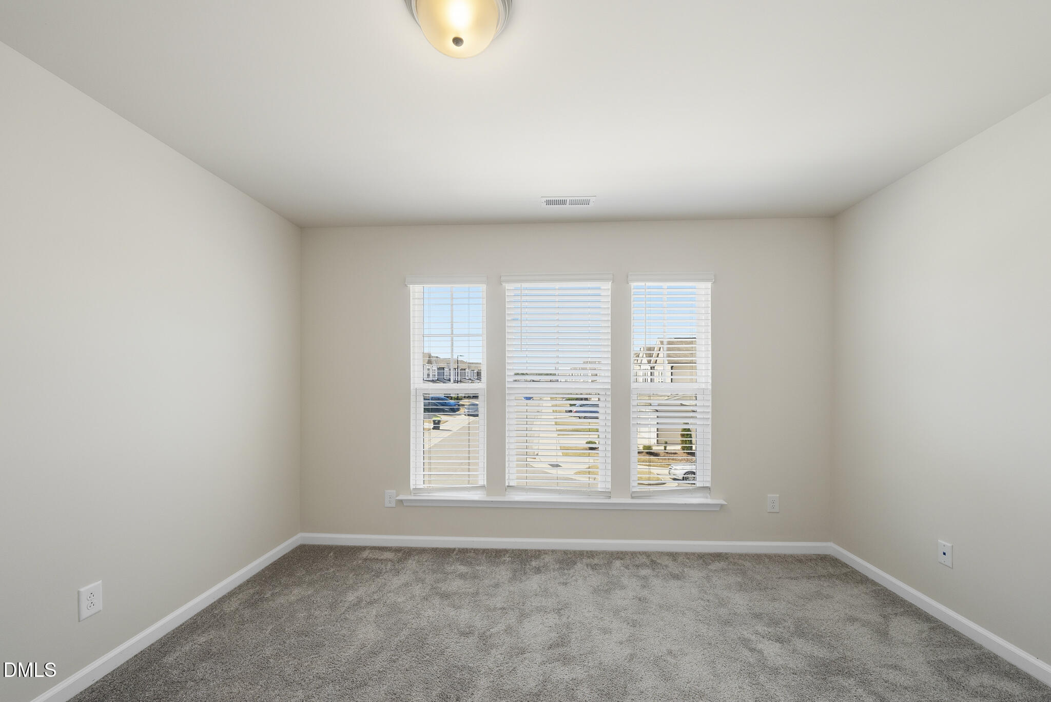 1012 Citadel Avenue Durham, NC 27713 - Photo 23 of 34 an empty room with windows