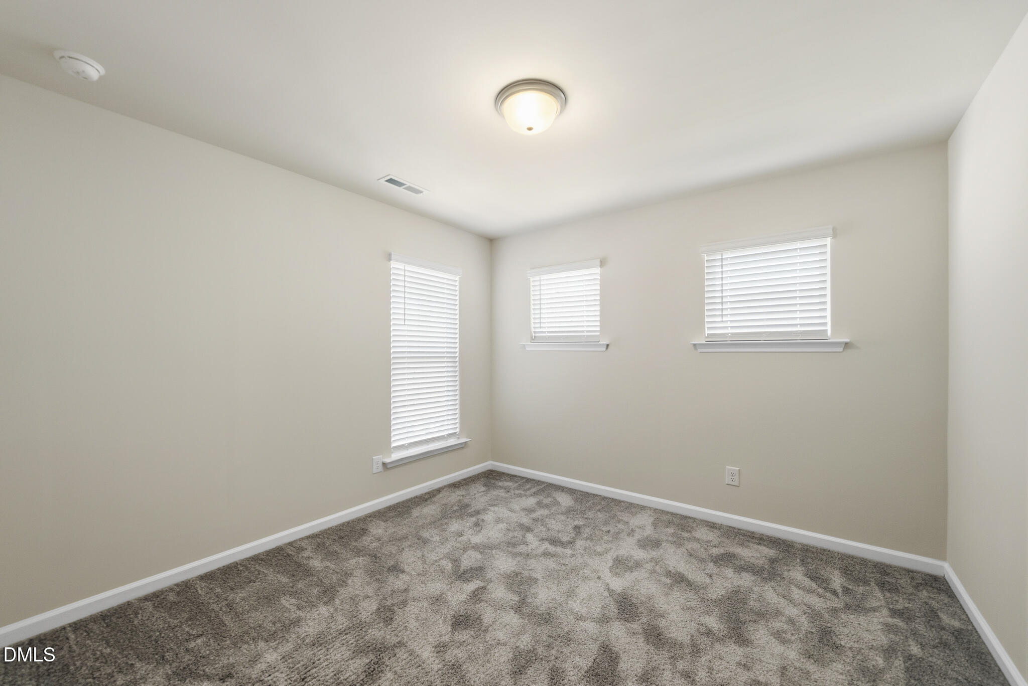 1012 Citadel Avenue Durham, NC 27713 - Photo 24 of 34 an empty room with windows